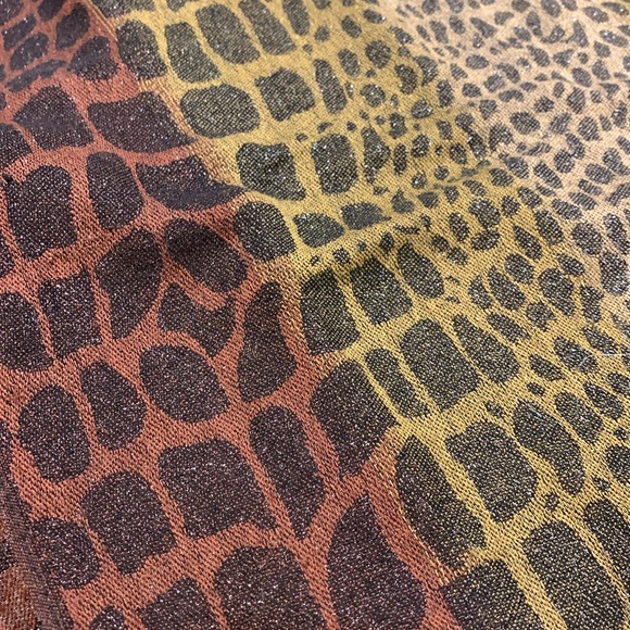 Animal print scarf with fringe. Scarf has a nice Sheen /sparkle. Approx. 64” - Picture 7 of 7